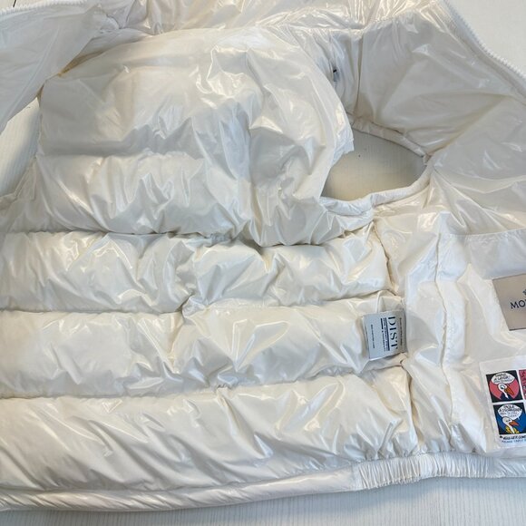 This Moncler white down vest features a mini-puffy design, offering warmth and c - Picture 6 of 8